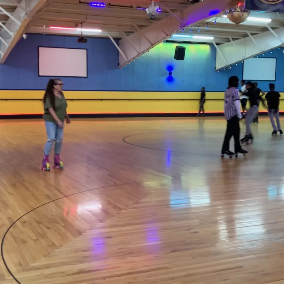 Jolynn skating on the rink floor