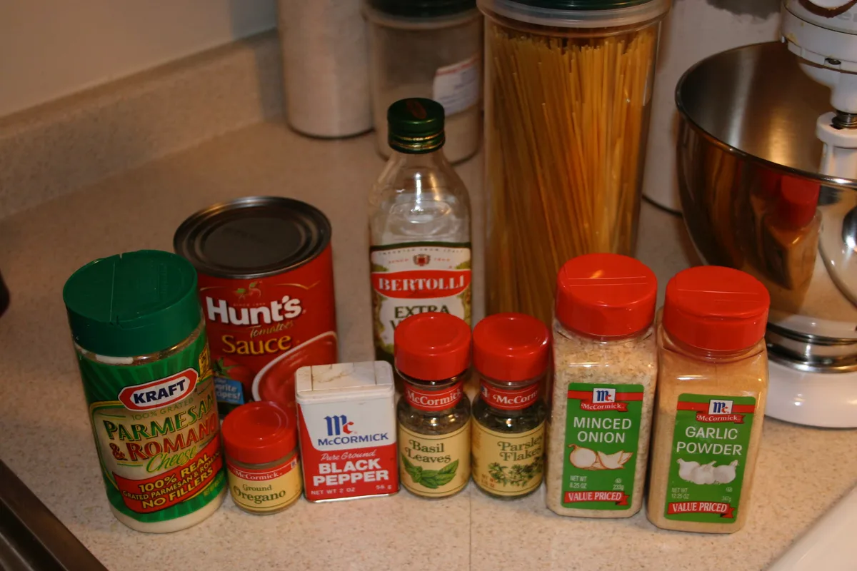 Spaghetti sauce ingredients lined up on the kitchen counter
