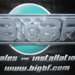 Airbrushed BigBF sign with silver lettering and a teal circle on black canvas