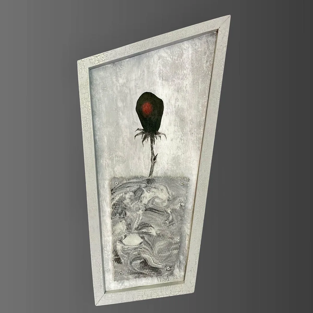 Frangible Red, acrylic on board with mounted wire mesh, showing a black flower with a burnt orange center on a textured gray background.